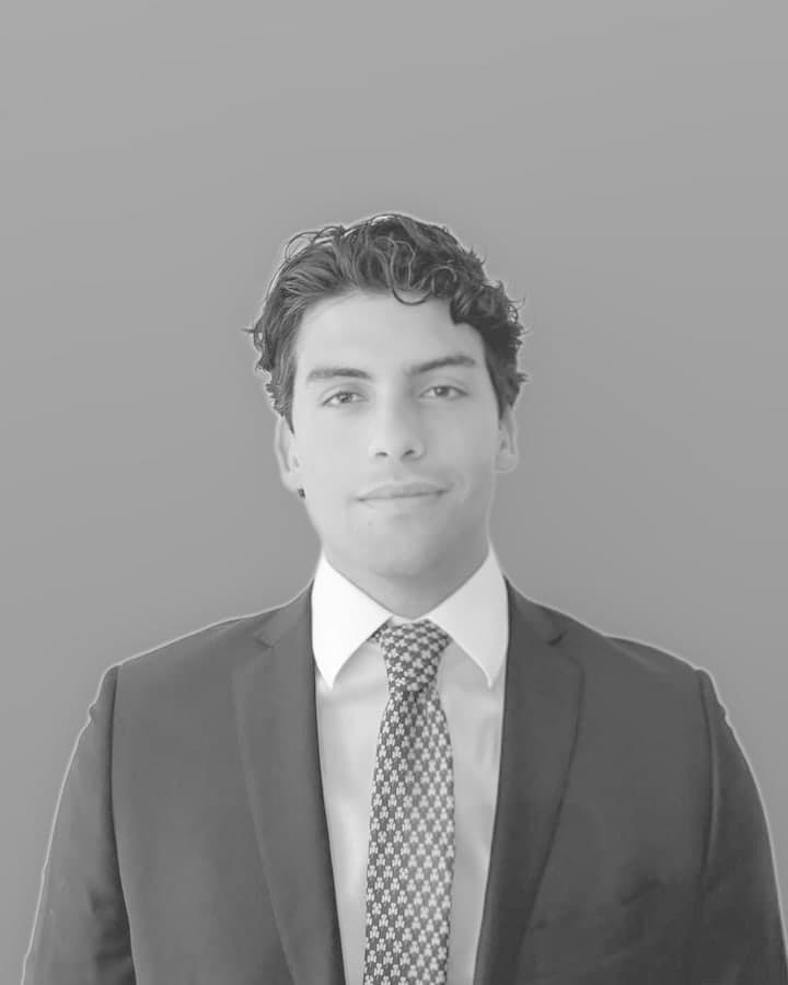 Armaan Waels, co-founder of Cogentic. Black-and-white portrait.