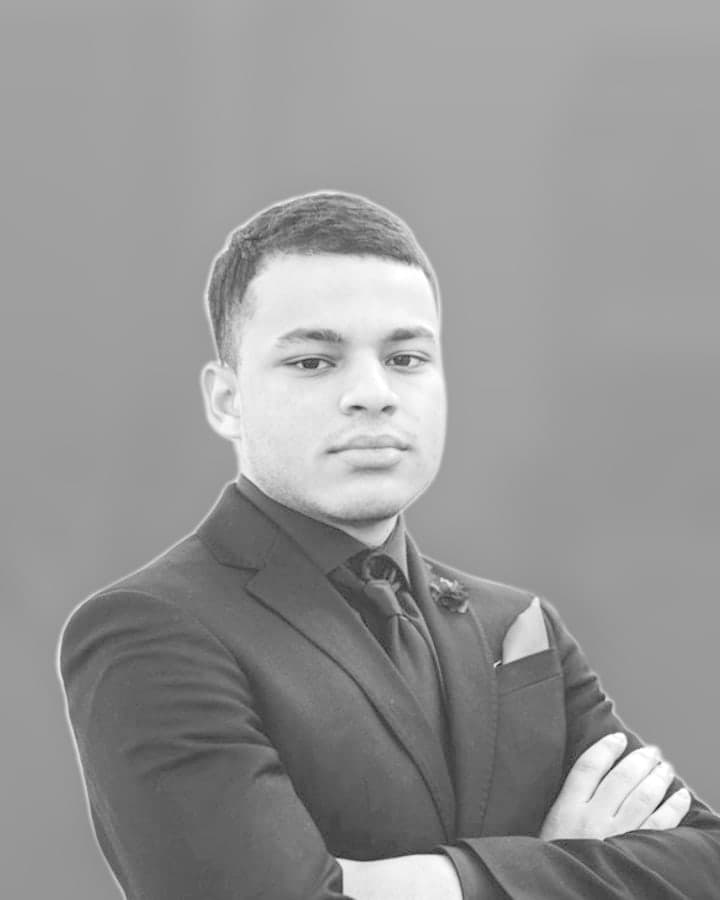 Aymane Arfaoui, co-founder of Cogentic. Black-and-white portrait.