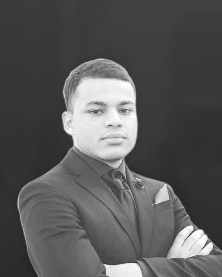 Aymane Arfaoui, co-founder of Cogentic. Black-and-white portrait.